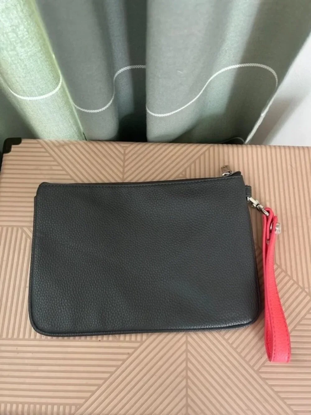 Thirty-one Wristlet bag embroidered with a floral “C”